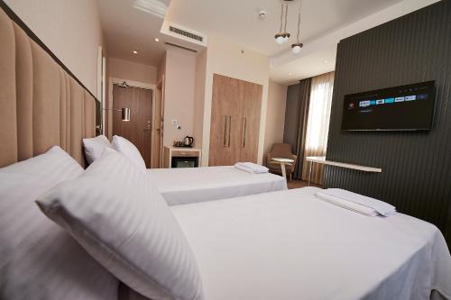 Imagen de la habitación del Hotel Livinton. Foto 9