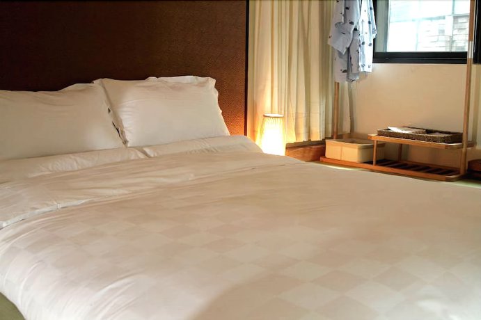 Imagen de la habitación del Hotel Livo, Shanghai. Foto 20