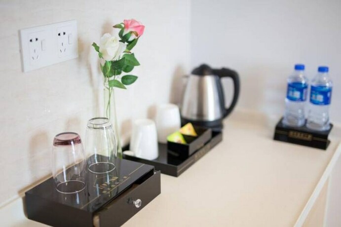 Imagen de la habitación del Hotel Liwu Apartment-green Land Plaza Branch. Foto 24