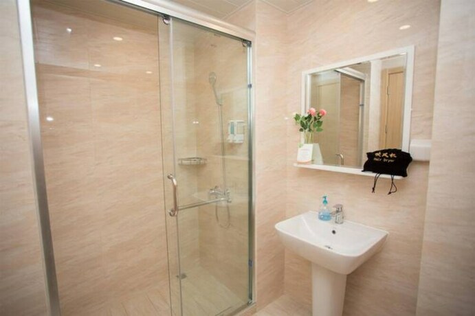 Imagen de la habitación del Hotel Liwu Apartment-green Land Plaza Branch. Foto 26