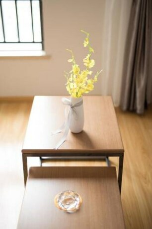 Imagen de la habitación del Hotel Liwu Apartment-green Land Plaza Branch. Foto 29