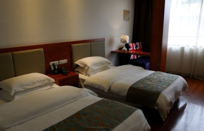 Imagen de la habitación del Hotel Lixin. Foto 4
