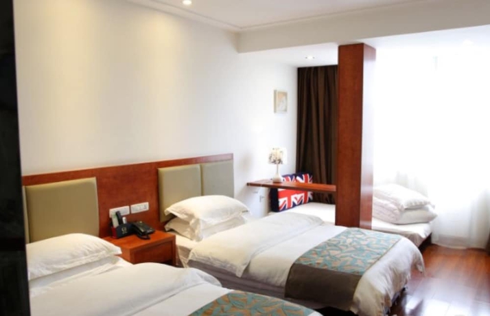 Imagen de la habitación del Hotel Lixin. Foto 7