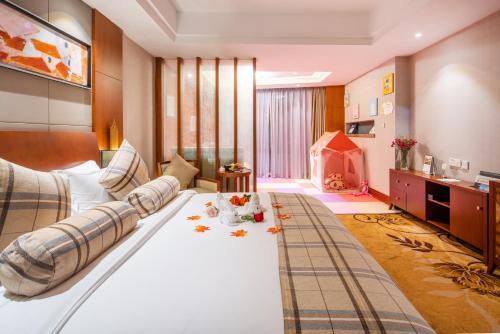 Imagen de la habitación del Hotel Liyang Golden Mountain Resort. Foto 15