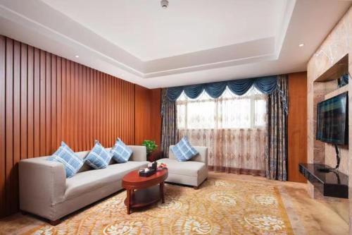 Imagen de la habitación del Hotel Liyang Golden Mountain Resort. Foto 18