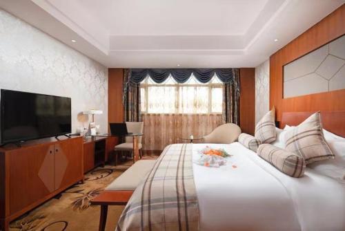 Imagen de la habitación del Hotel Liyang Golden Mountain Resort. Foto 19