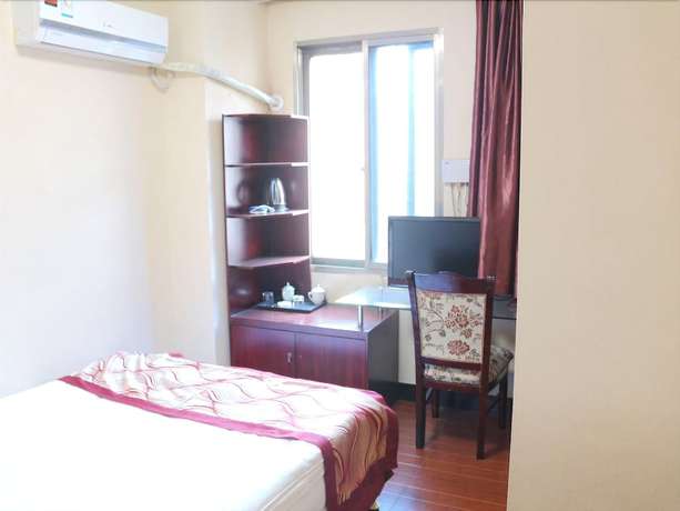 Imagen de la habitación del Hotel Liyang Huamei Hotel. Foto 8