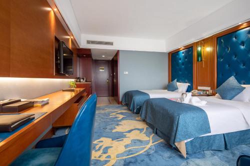 Imagen de la habitación del Hotel Liyang Jinfeng International. Foto 13