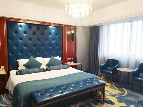 Imagen de la habitación del Hotel Liyang Jinfeng International. Foto 14