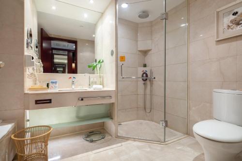 Imagen de la habitación del Hotel Liyang Jinfeng International. Foto 18