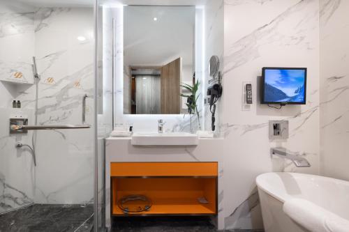 Imagen de la habitación del Hotel Liyang Jinfeng International. Foto 20