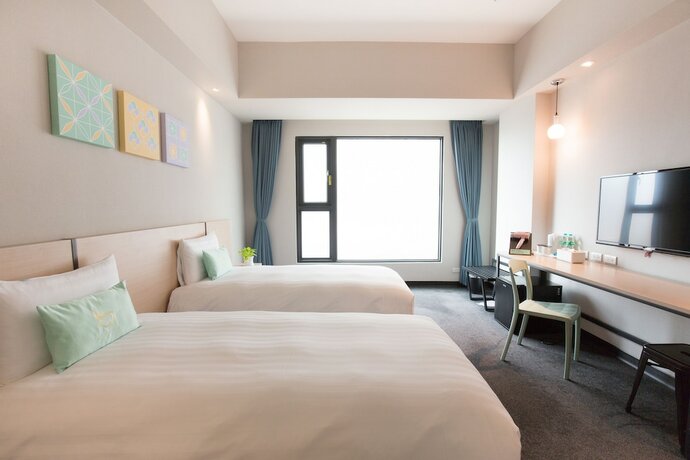 Imagen de la habitación del Hotel Liyaou. Foto 7
