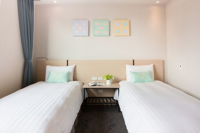 Imagen de la habitación del Hotel Liyaou. Foto 8