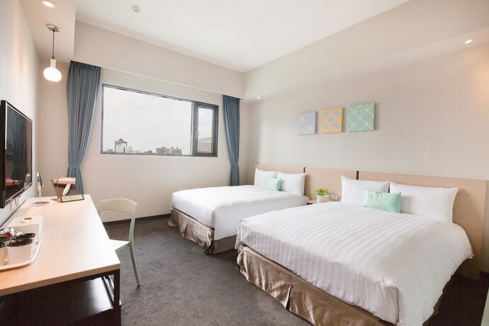 Imagen de la habitación del Hotel Liyaou. Foto 9