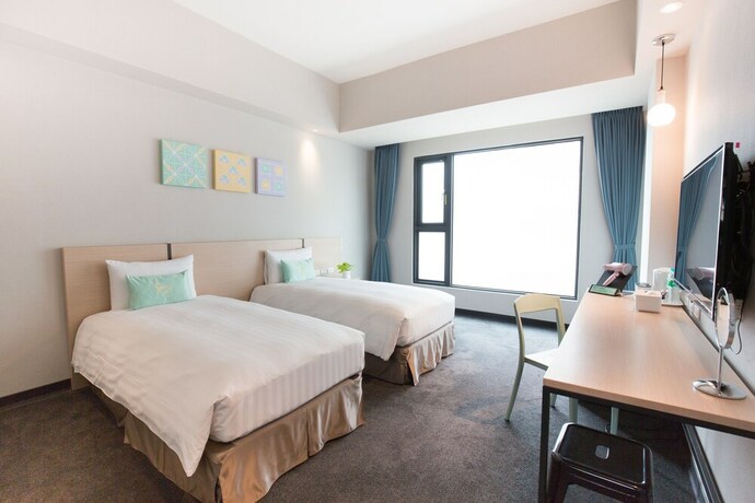 Imagen de la habitación del Hotel Liyaou. Foto 10
