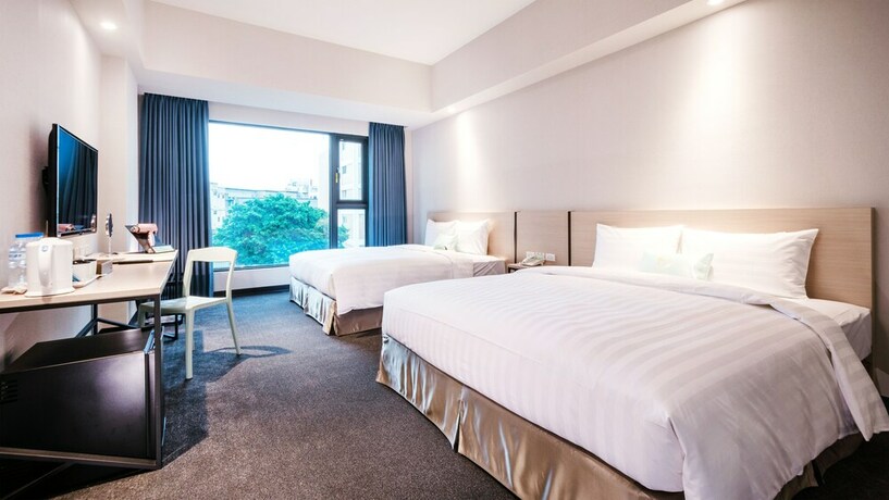 Imagen de la habitación del Hotel Liyaou. Foto 11
