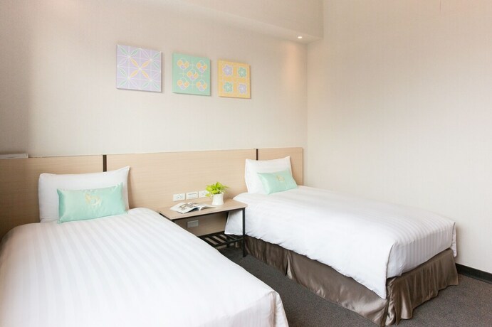 Imagen de la habitación del Hotel Liyaou. Foto 14