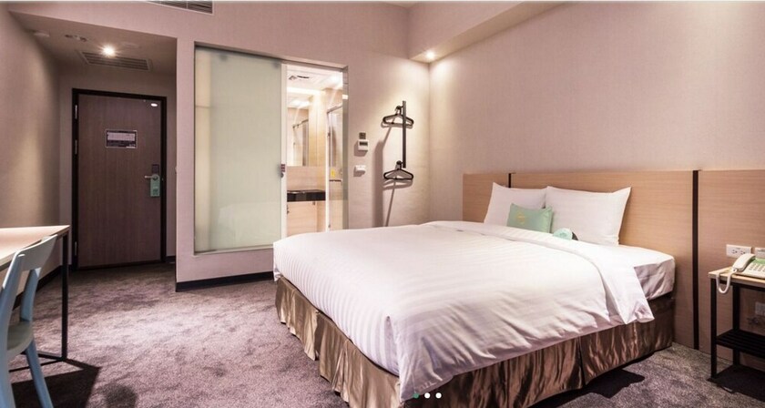 Imagen de la habitación del Hotel Liyaou. Foto 15