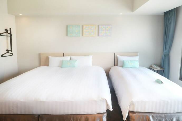 Imagen de la habitación del Hotel Liyaou. Foto 18