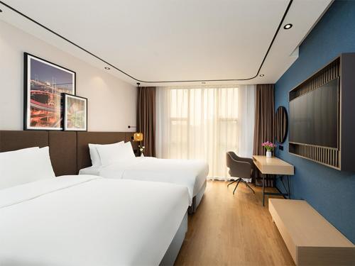 Imagen de la habitación del Hotel Liying - Guangzhou Baiyun International Airport Yingbin Avenue. Foto 16
