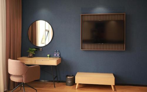Imagen de la habitación del Hotel Liying - Guangzhou Baiyun International Airport Yingbin Avenue. Foto 17
