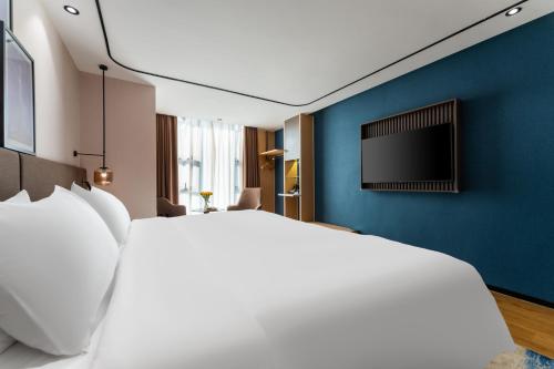 Imagen de la habitación del Hotel Liying - Guangzhou Baiyun International Airport Yingbin Avenue. Foto 19