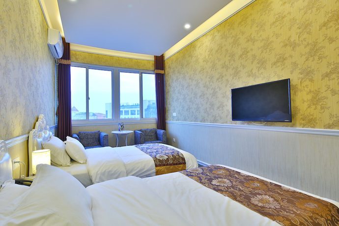Imagen de la habitación del Hotel Liyuan Business. Foto 6