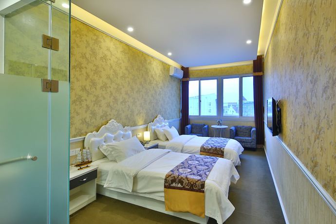 Imagen de la habitación del Hotel Liyuan Business. Foto 7