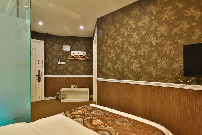 Imagen de la habitación del Hotel Liyuan Business. Foto 14