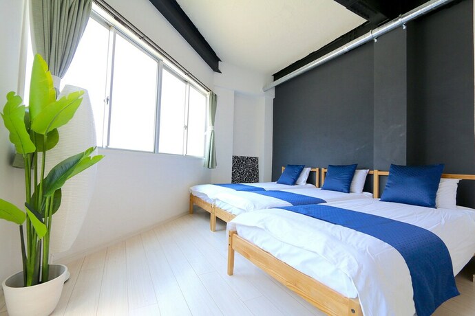 Imagen de la habitación del Hotel Liz Guest House Umeda. Foto 20