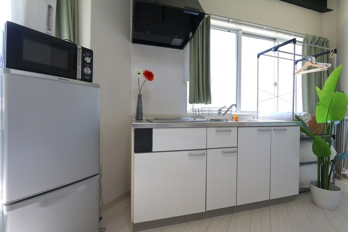 Imagen de la habitación del Hotel Liz Guest House Umeda. Foto 34