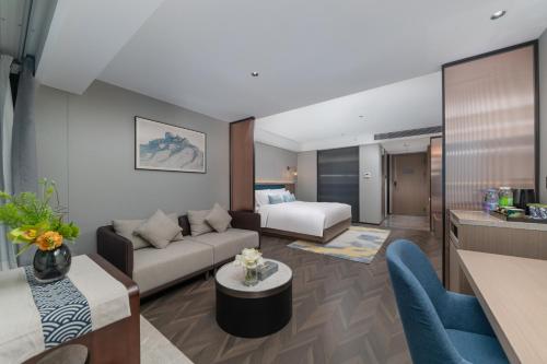 Imagen de la habitación del Hotel Liz Maoming Dianbai. Foto 19