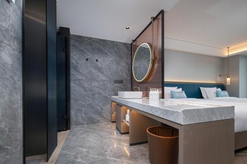 Imagen general del Hotel Liz Maoming Dianbai. Foto 11