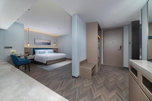 Imagen general del Hotel Liz Maoming Dianbai. Foto 12