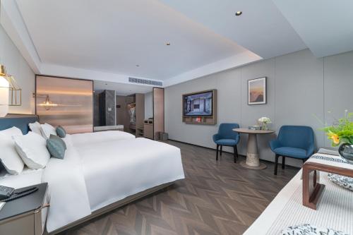 Imagen general del Hotel Liz Maoming Dianbai. Foto 13