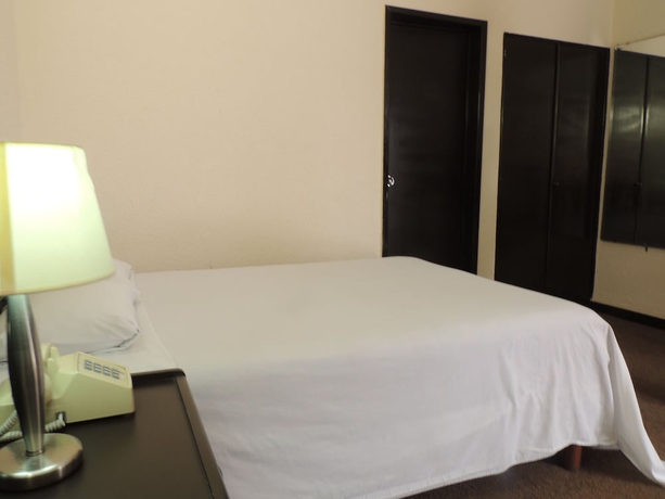 Imagen de la habitación del Hotel Lizbeth. Foto 9