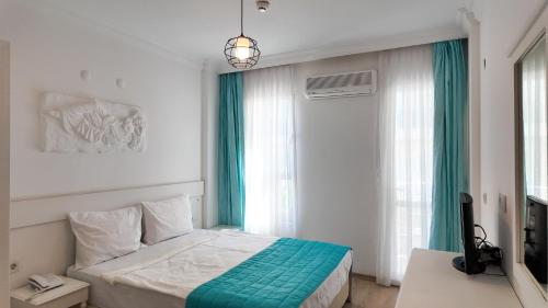 Imagen de la habitación del Hotel Lizbonia &Ccedil;eşme. Foto 20