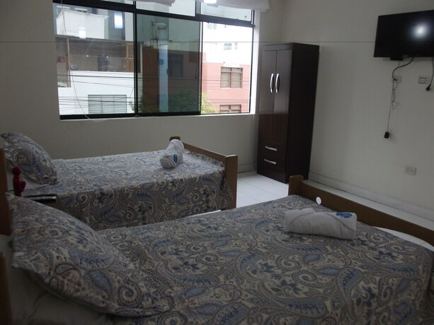 Imagen de la habitación del Hotel Llama Brothers. Foto 3
