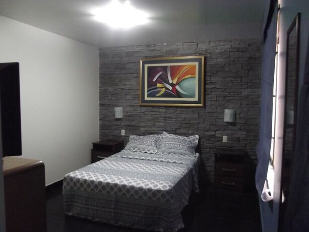 Imagen de la habitación del Hotel Llama Brothers. Foto 10