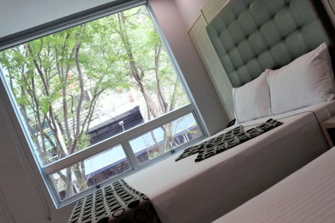 Imagen de la habitación del Hotel Lleras Express. Foto 7