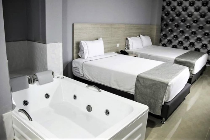 Imagen de la habitación del Hotel Lleras Express. Foto 10