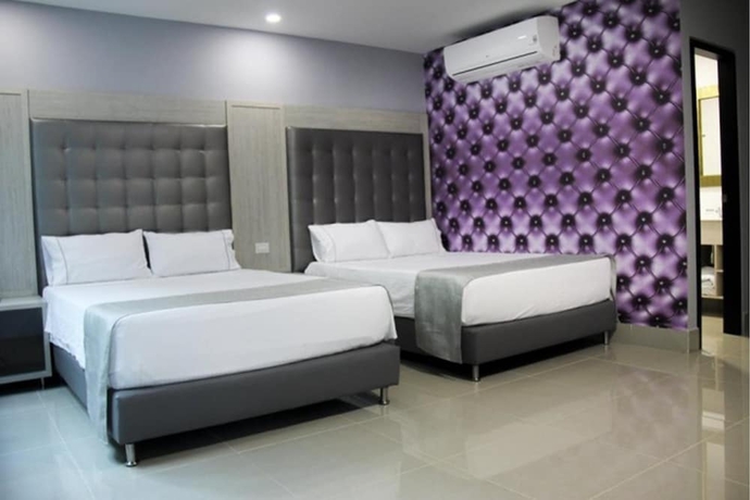 Imagen de la habitación del Hotel Lleras Express. Foto 11