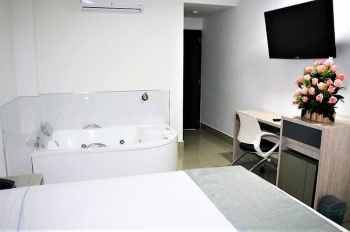 Imagen de la habitación del Hotel Lleras Express. Foto 13