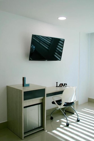 Imagen de la habitación del Hotel Lleras Express. Foto 16