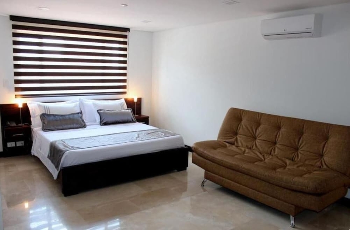 Imagen de la habitación del Hotel Lleras Express. Foto 17