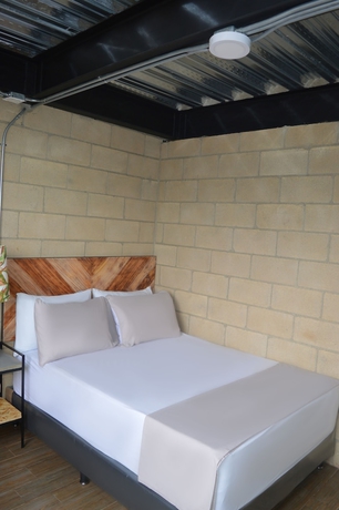 Imagen de la habitación del Hotel Lleras Park Concept. Foto 6