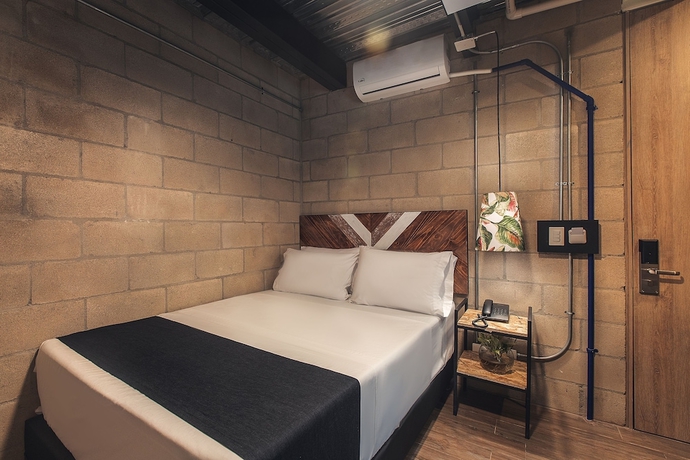 Imagen de la habitación del Hotel Lleras Park Concept. Foto 8