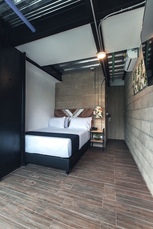 Imagen de la habitación del Hotel Lleras Park Concept. Foto 9