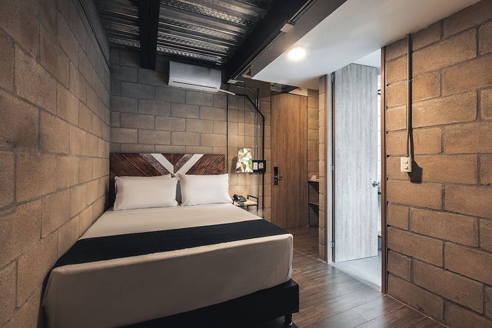 Imagen de la habitación del Hotel Lleras Park Concept. Foto 10