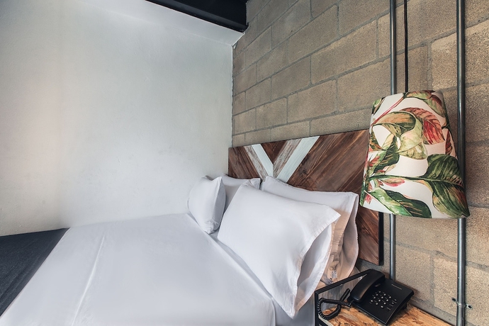 Imagen de la habitación del Hotel Lleras Park Concept. Foto 11